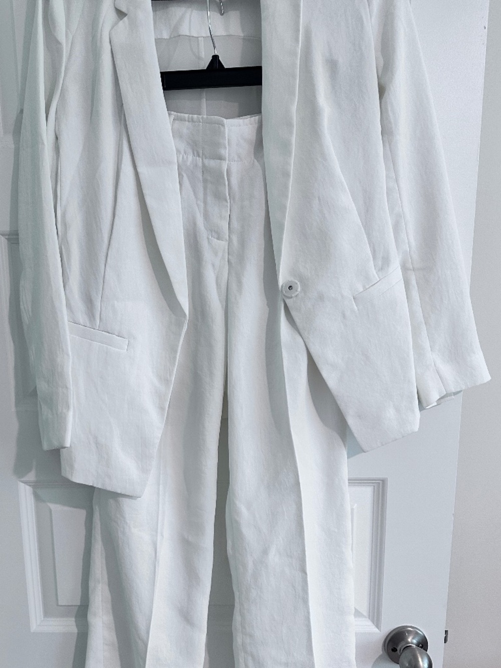 DKNY linen-silk like white suit with sheer back and taper leg size 2
